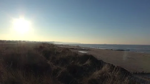 Sun view on the beach with dunes Video stock 76910970