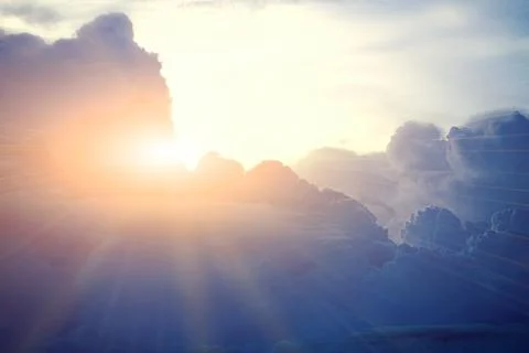 The sun was setting on the clouds in the evening Stock Photos