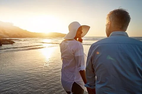 The sun will never set on our love. a mature couple spending the day at the Stock Photos