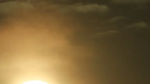 Sun in wispy clouds Stock Footage 113519735