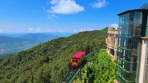 Sun World Ba Na Hills Funicular Mountain Climbing Train with Scenic Da Nang Stock Footage 332118341
