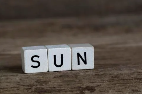 Sun, written in cubes Stock Photos