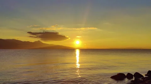 Sun on Yellow Sky at Sunset over Sea Coast Stock Footage 303026258