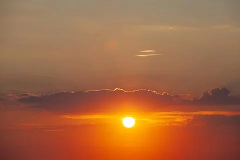 Sunball sunset with clouds background sky Stock Photos