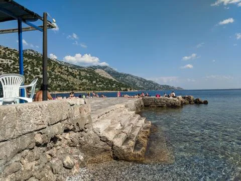 Sunbathers on the beach in Karlobag Stock Photos