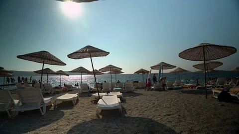 Sunbathers by the sea Stock-Footage 125476748