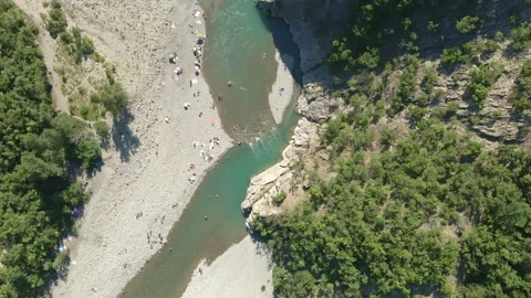 Sunbathers At Trebbia River, Brugnello Stock Footage 134647492