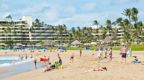 Sunbathing and Tanning on Public Beach in Maui Hawaii Video stock 61085703