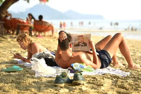 Sunbathing on the beach. Stock Photos