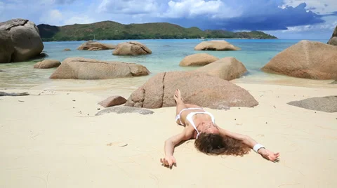 Sunbathing on the beautiful beach Stock Footage 36094081