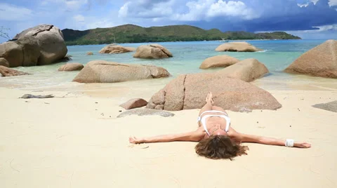 Sunbathing on the beautiful beach Stock Footage 36094100