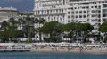 Sunbathing People at Cannes Beach France Beachfront French Riviera Cote d'Azur HD Footage