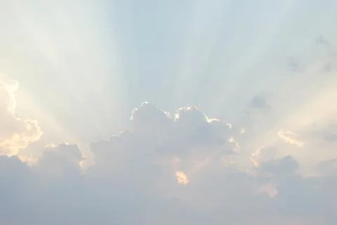 Sunbeam on blue sky Stock Photos