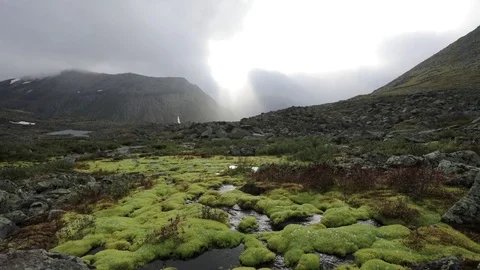A sunbeam makes its way through the clouds. TimeLapse Stock Footage 93953814