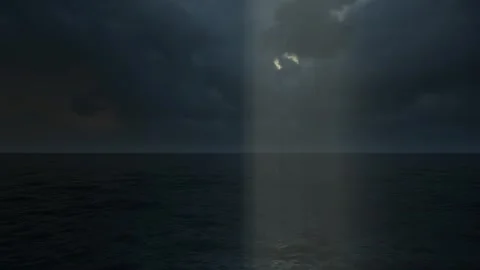 Sunbeam Piercing Dark Storm Clouds Over Calm Sea Stock Footage 339376190