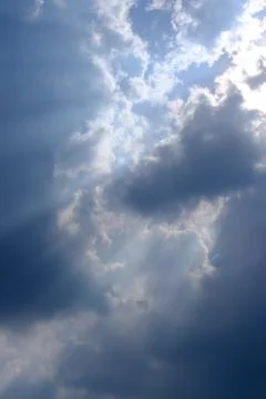 Sunbeam, sunlight through the haze, cloud on the blue sky . Cloud with sun ra Foto stock