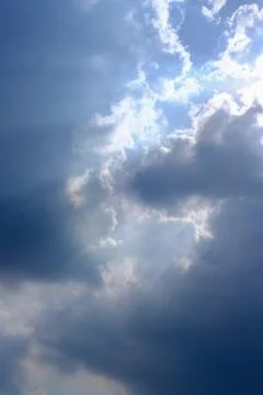 Sunbeam, sunlight through the haze, cloud on the blue sky . Cloud with sun ra Stock-Fotos