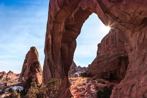 Sunbeam through Pine Tree Arch, Arches National Park, Utah Stock Photos