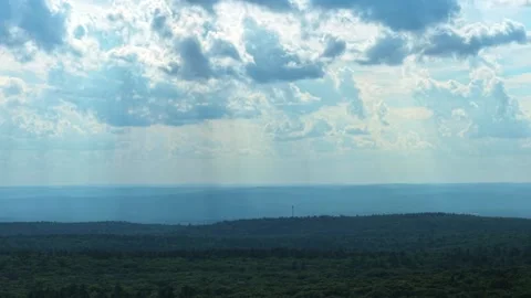 Sunbeams and Clouds Over Forested Hills Near Quabbin Reservoir, Massachusetts Stock Footage 340260173