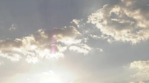 Sunbeams and Racing Clouds 4k Time-lapse Stock Footage 106855775
