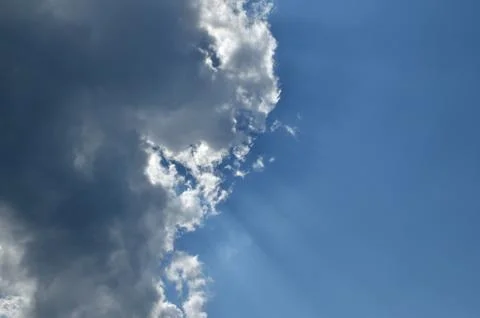 Sunbeams Behind Cloud Stock Photos