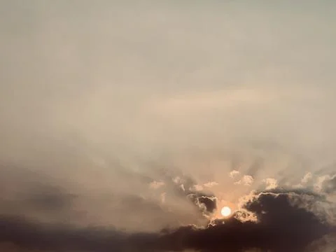 Sunbeams Breaking Through Dark Clouds at Dusk Jakarta Indonesia Stock Photos