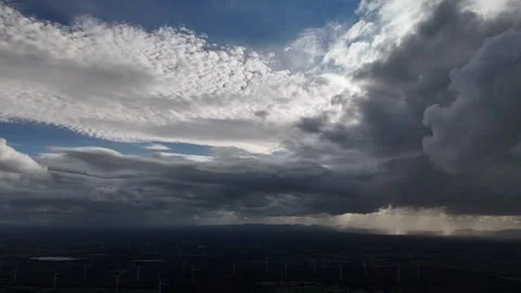 Sunbeams Breaking Through Dramatic Storm Clouds Over Landscape 스톡 동영상 337852103