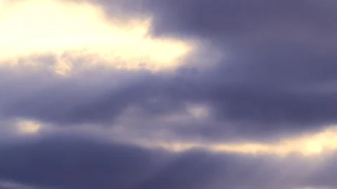 Sunbeams with bright clouds in the morning sky - 4k Real Time Video Stock Footage 108108908