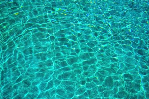 Sunbeams Dancing on Azure Waves - Abstract Background Stock Photos