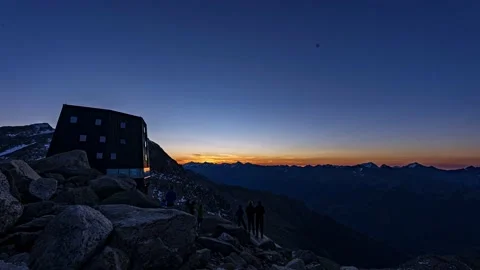 Sunbeams hit modern alpine architecture Stock Footage 144936306