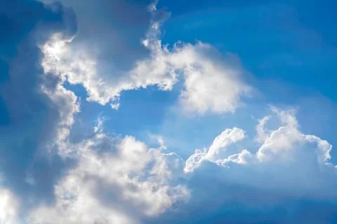 Sunbeams Light and Moody Cloudscape. Nature Background Concept Stock Photos