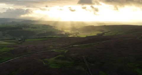Sunbeams over moorland Stock Footage 249593382