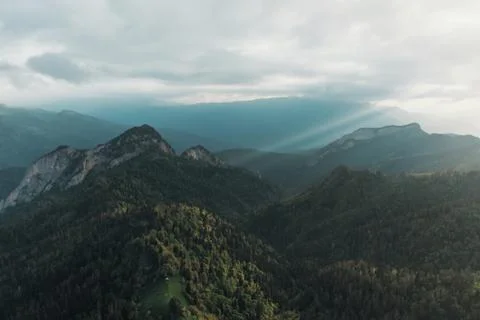 Sunbeams over mountains. Stock Photos