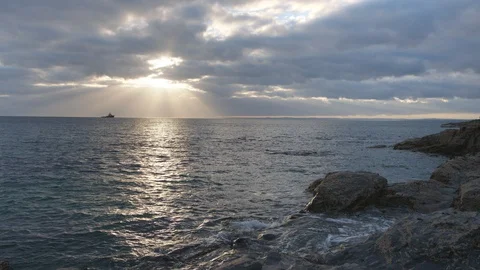 Sunbeams over the ocean in Cornwall, England. Stock Footage 128210359