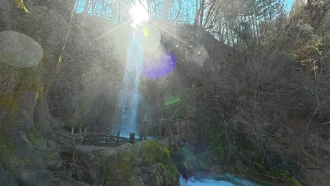 Sunbeams pierce through a forest canopy. Mount Ozren Video stock 330551871