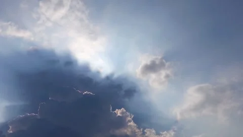 Sunbeams Piercing Through Cumulus Cloudscape Stock Footage 311587165