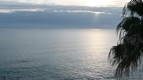 Sunbeams reflecting on ocean water surface Stock Footage 295174054