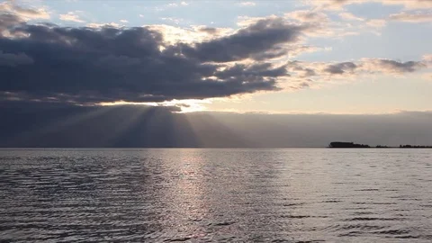 Sunbeams reflecting in the river at sunset, Ob River, Siberia, Russia Stock Footage 81204020