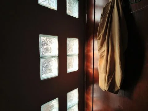 Sunbeams shining through glass bricks Stock Photos