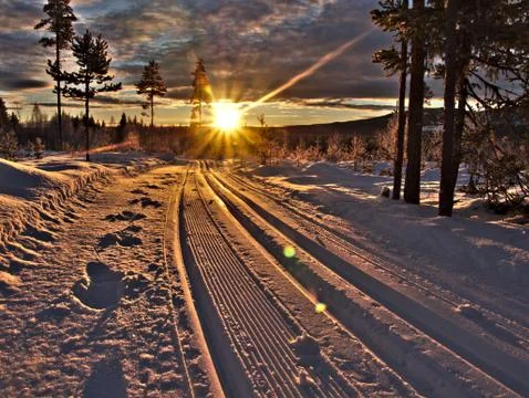 Sunbeams on ski run Stock Photos