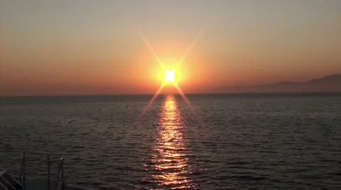 Sunbeams of the sunset on the sea 2 Stock Footage 21616969