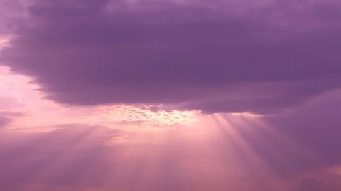 Sunbeams through clouds Stock Footage 84719841