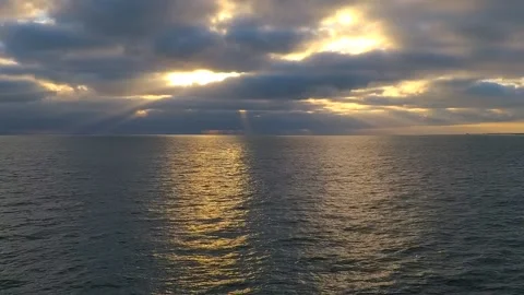 Sunbeams through the clouds over California Coast Stockbeeldmateriaal 145434078