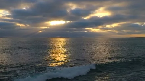 Sunbeams Through Clouds Over California Coastal Water - sub 02 Stock Footage 145510769