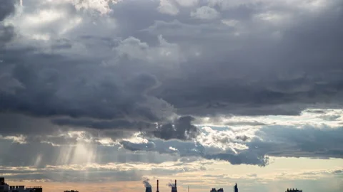 Sunbeams through the clouds in the stormy weather, Timelapse Stock Footage