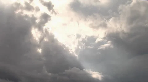 Sunbeams through storm clouds time lapse Stock Footage 32898766