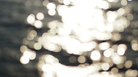 Sunbeams of water lake in defocus Stock Footage 204979941