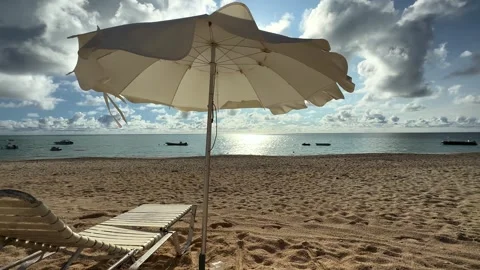 Sunbed and umbrella on the beach Stock Footage 249386252