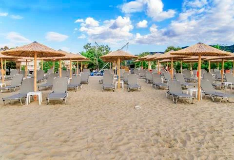 Sunbed on beach background front view Stock Photos