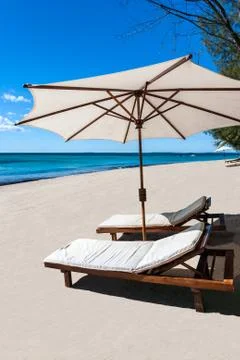 Sunbed on the beach Stock Photos